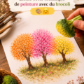 Image d'une œuvre d'art créée avec de la peinture et du brocoli, montrant des couleurs vives et des motifs amusants.