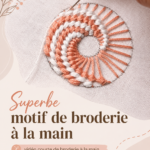 Broderie mains sur tissu avec un motif floral coloré