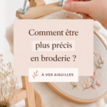 Une brodeuse concentrée sur son travail avec des fils colorés