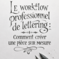 Une femme créant un lettrage professionnel personnalisé sur une feuille blanche.