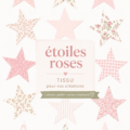 Tissu rose avec étoiles blanches, parfait pour des projets créatifs